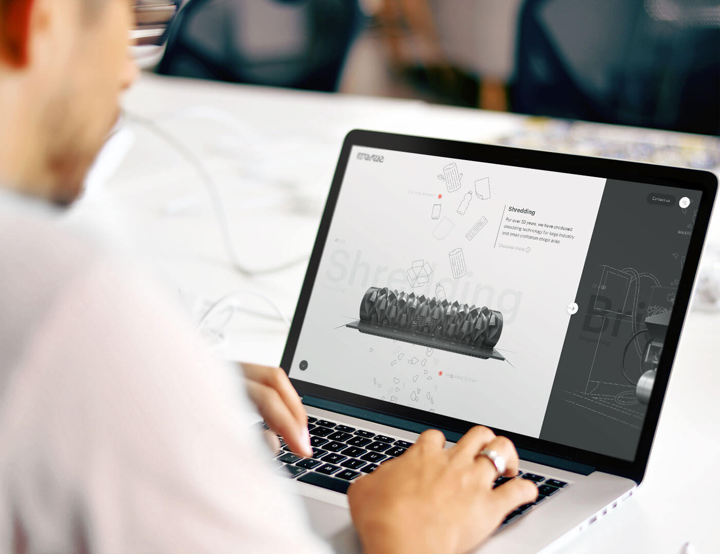 Man visits Weima homepage on a laptop